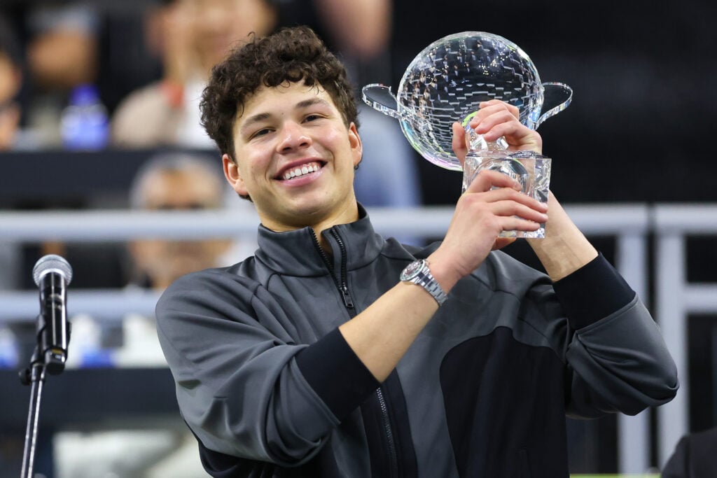 Ben Shelton holding the winners trophy after beating Taylor Fritz in the 2026 Dallas Open final.
