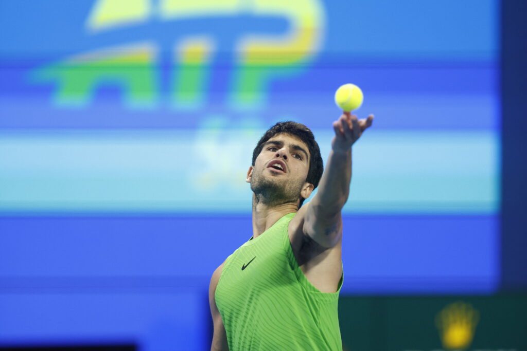 Carlos Alcaraz serves at the Qatar Open.