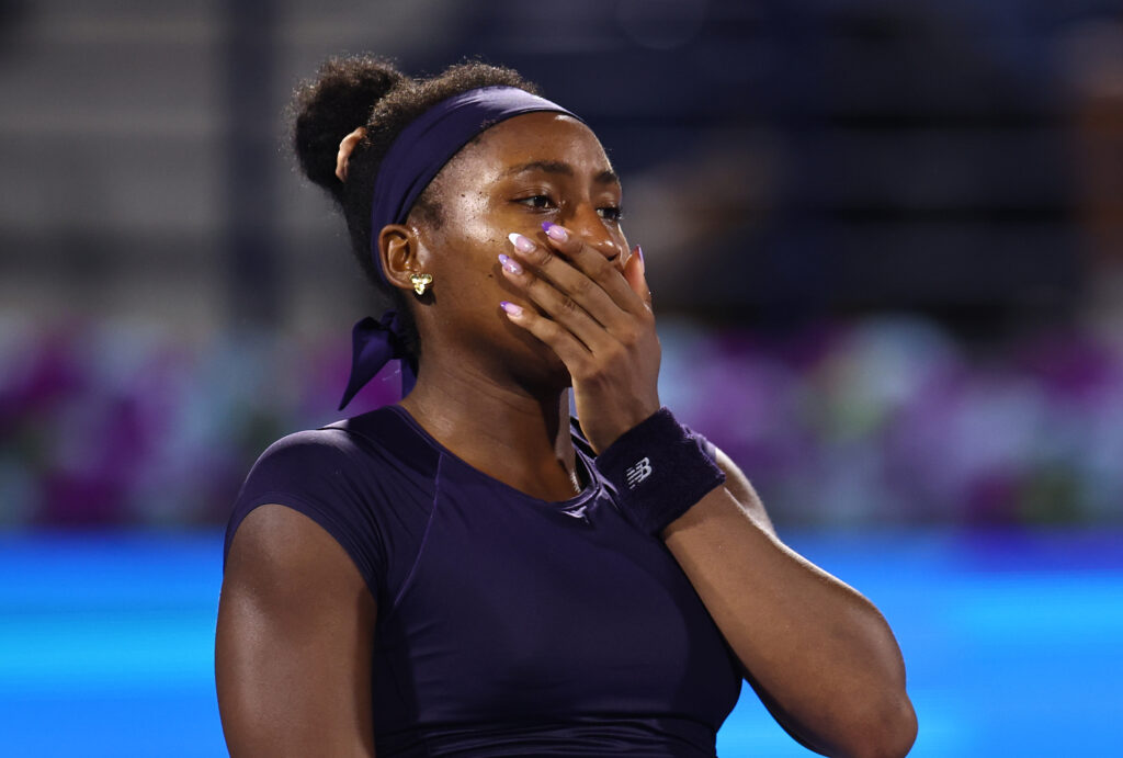 Coco Gauff covers her mouth
