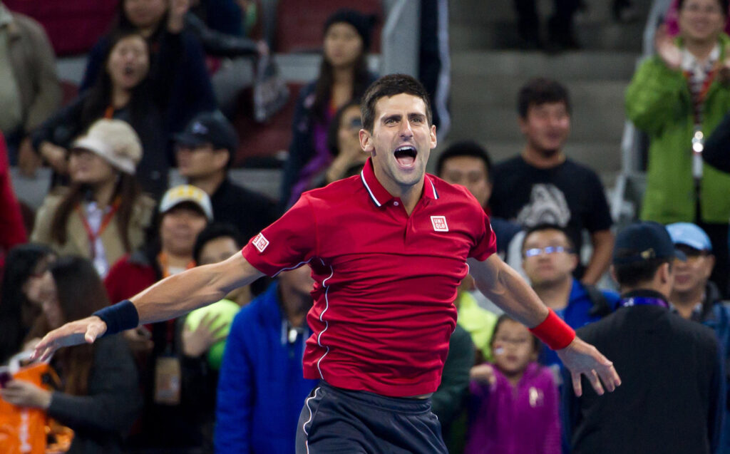 Novak Djokovic celebrates at the 2014 China Open.