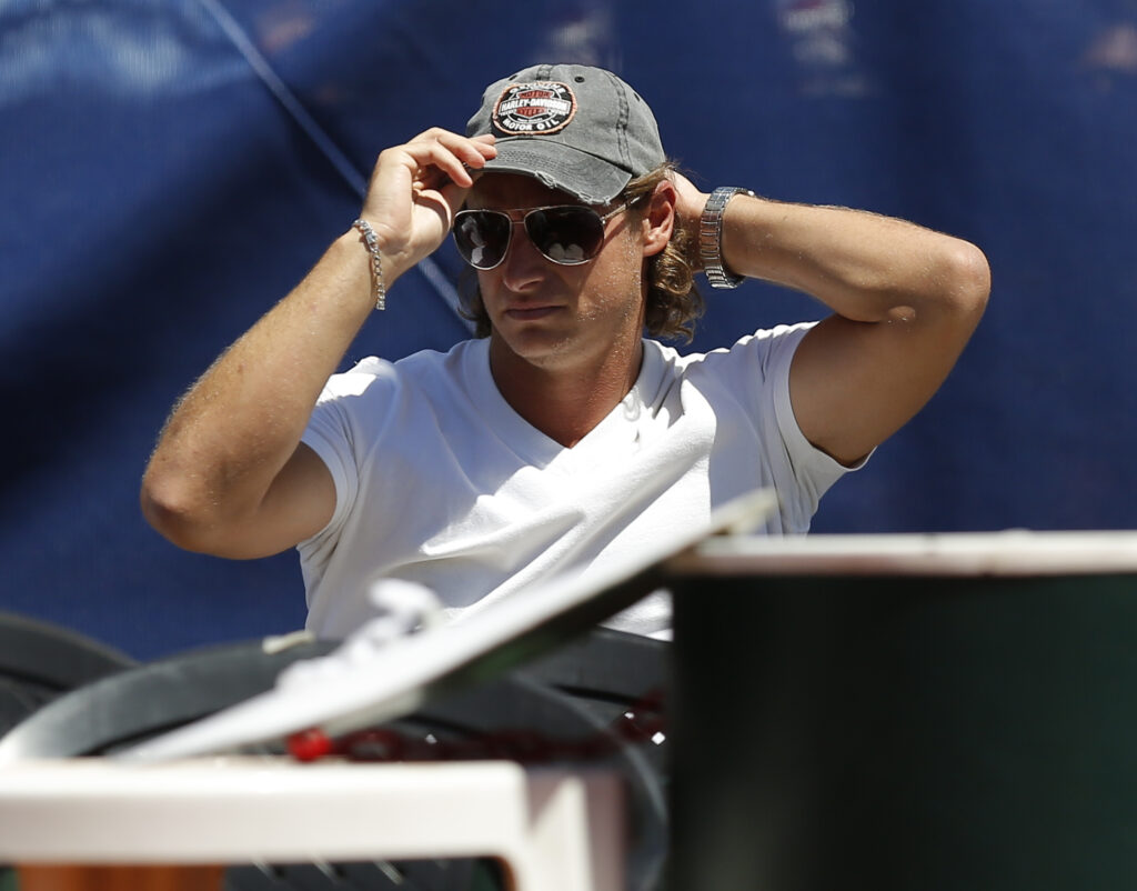 David Nalbandian watching the Davis Cup tie between Argentina and Italy in 2014.