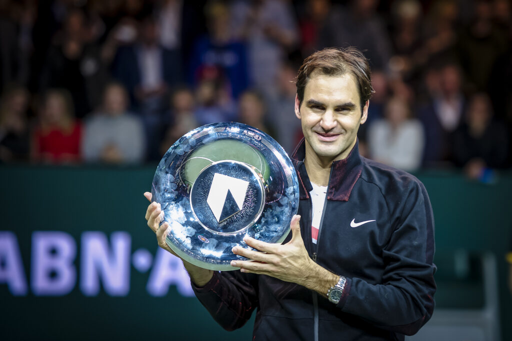 Roger Federer holding the Rotterdam Open trophy in 2018.