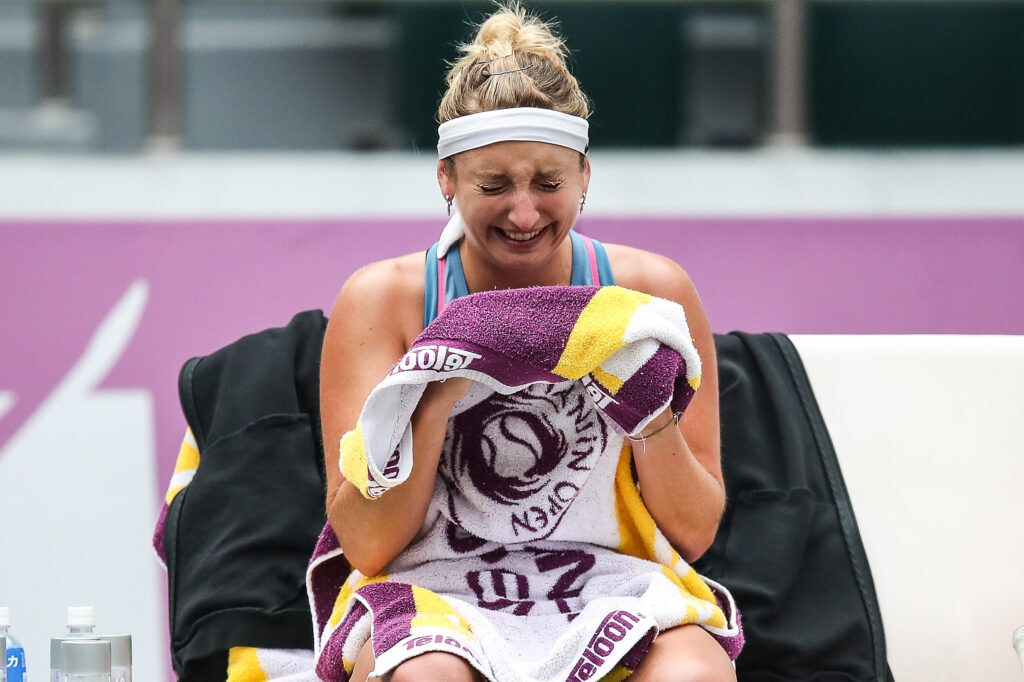 Timea Bacsinszky reacts after beating Aryna Sabalenka at the Tianjin Open in 2018.