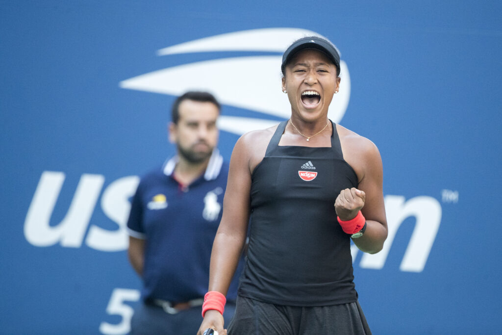 Naomi Osaka celebrates a point against Aryna Sabalenka at the 2018 US Open.