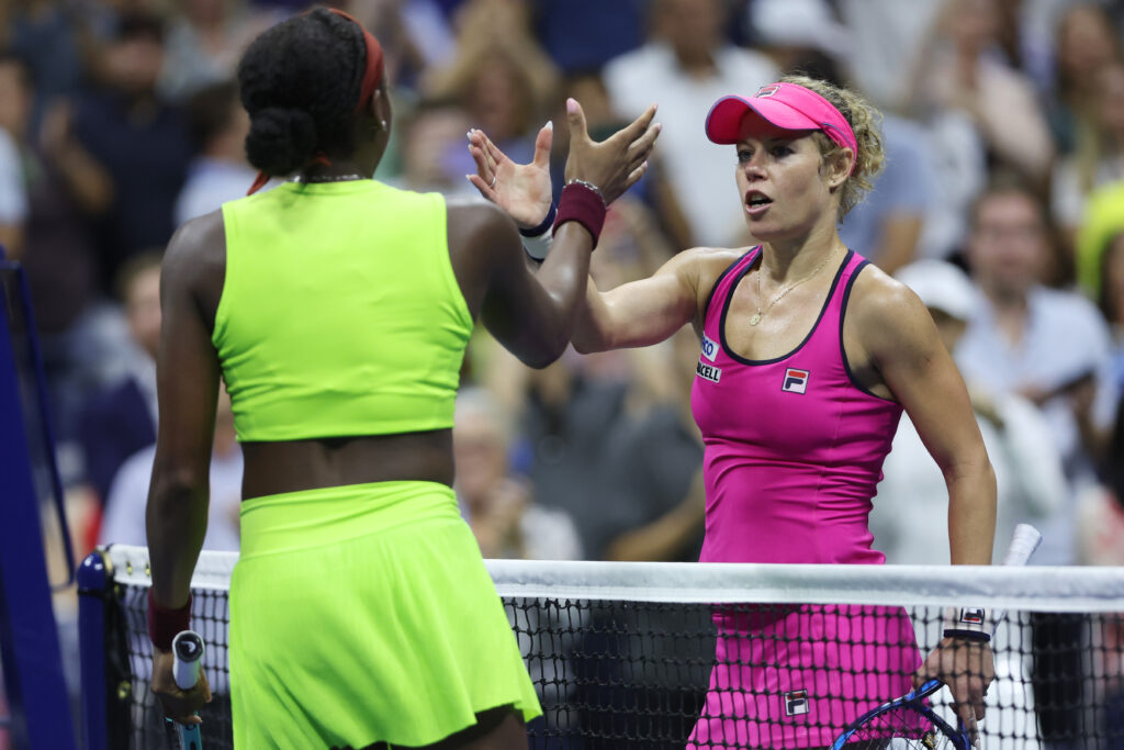 Coco Gauff shakes Laura Siegemund's hand after beating her at the 2023 US Open.