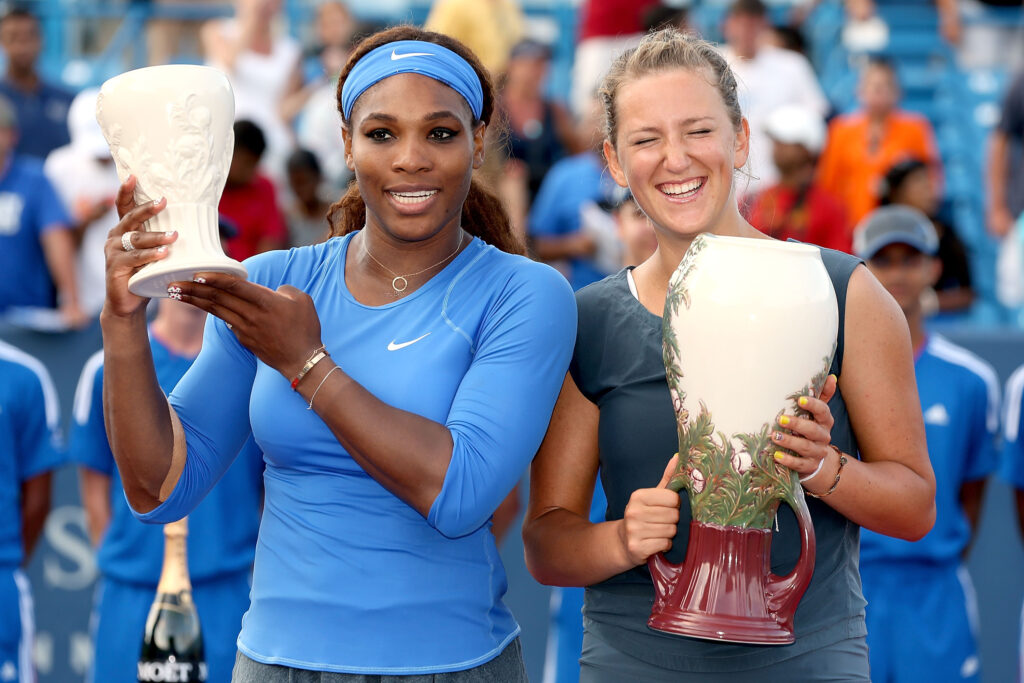 Serena Williams and Victoria Azarenka pose with their respective trophies after the 2013 Cincinnati Open final.