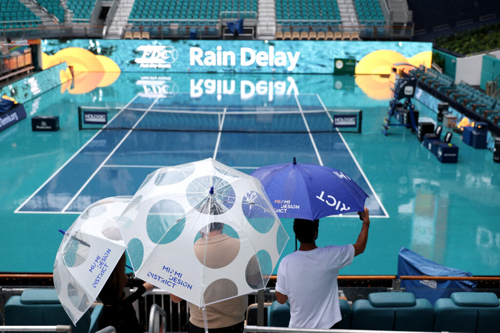 Fans wait in the stand during a rain delay at the 2024 Miami Open.