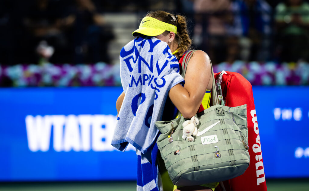 Mirra Andreeva leaves the court in tears after losing to Amanda Anisimova at the 2026 Dubai Tennis Championships.