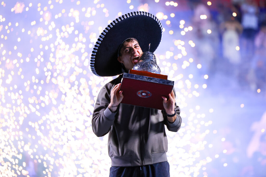 Flavio Cobolli poses with the trophy after winning the 2026 Mexican Open.
