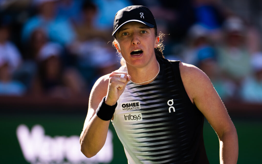 Iga Swiatek celebrates after beating Kayla Day at Indian Wells in 2026.