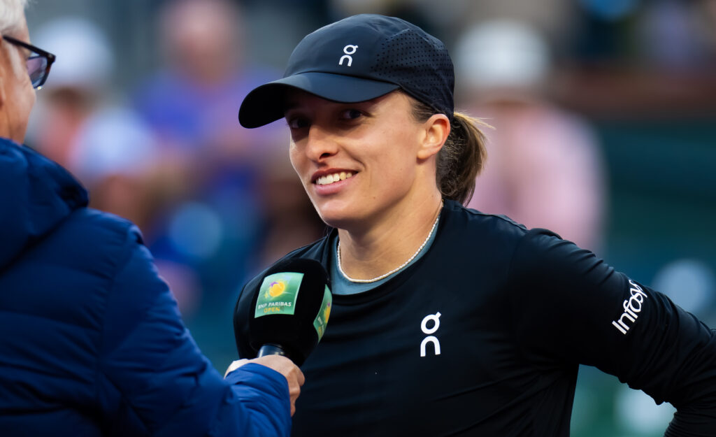 Iga Swiatek speaks in her on-court interview after beating Maria Sakkari at Indian Wells in 2026.