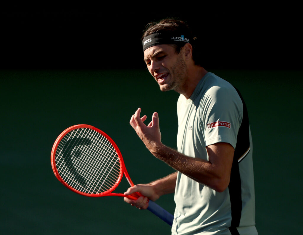 Taylor Fritz expresses frustration during his match against Alex Michelsen at Indian Wells in 2026.