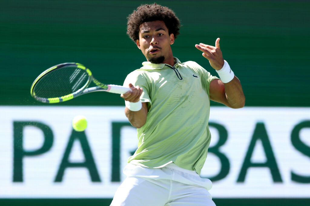 Arthur Fils hits a forehand against Felix Auger-Aliassime at Indian Wells in 2026.