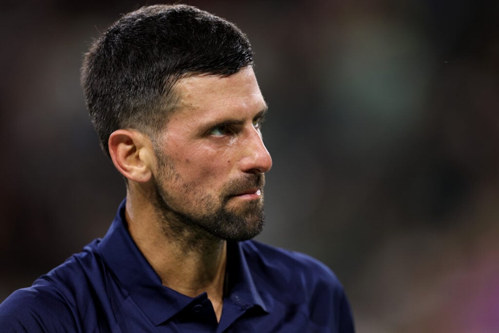 Novak Djokovic looks on during his match against Jack Draper at Indian Wells in 2026.