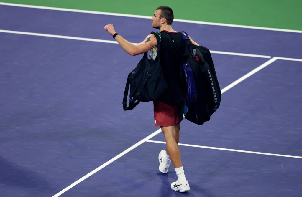 Jack Draper walks off court after losing to Daniil Medvedev at Indian Wells in 2026.