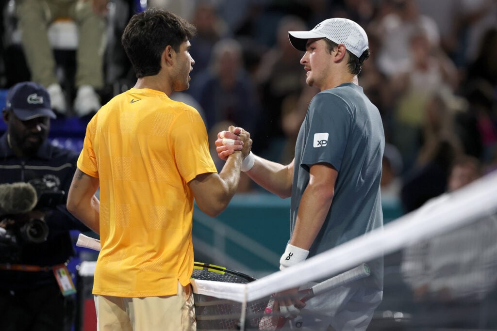 Carlos Alcaraz and Joao Fonseca shake hands