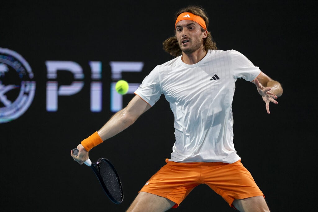 Stefanos Tsitsipas hits a forehand against Arthur Fils at the 2026 Miami Open.