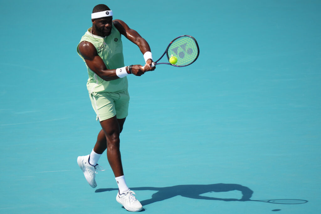 Frances Tiafoe hits a backhand against Jakub Mensik at the 2026 Miami Open.