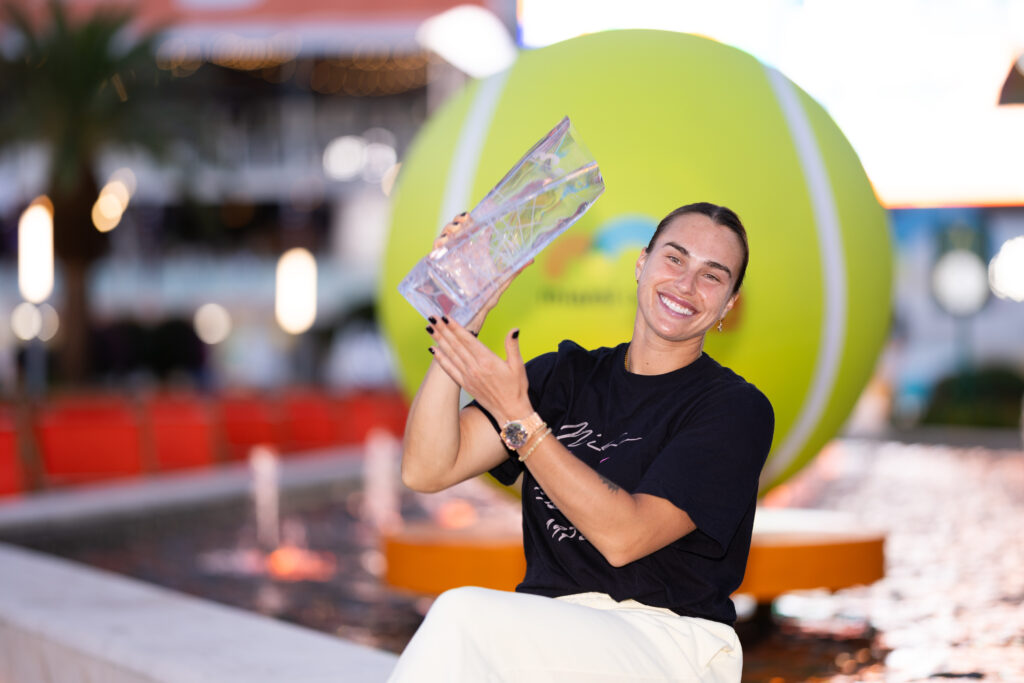 Aryna Sabalenka poses with the women's singles title after winning the 2026 Miami Open title.