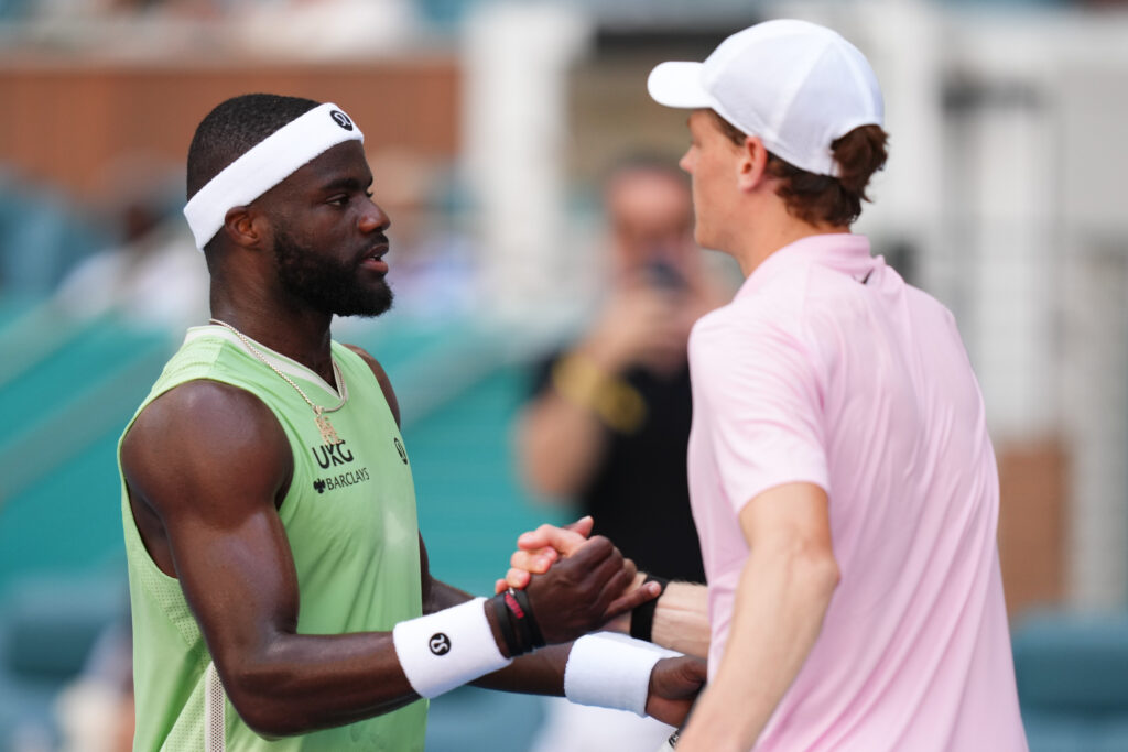 Jannik Sinner and Frances Tiafoe shake hands after their match in Miami.