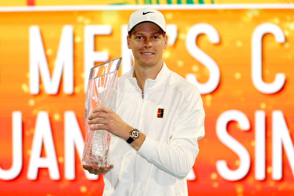 Jannik Sinner poses with the trophy after winning the 2026 Miami Open title.