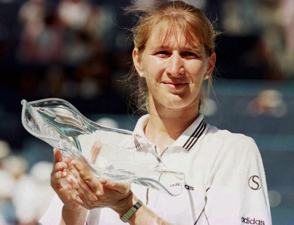 Steffi Graf holds the Indian Wells title in 1996.