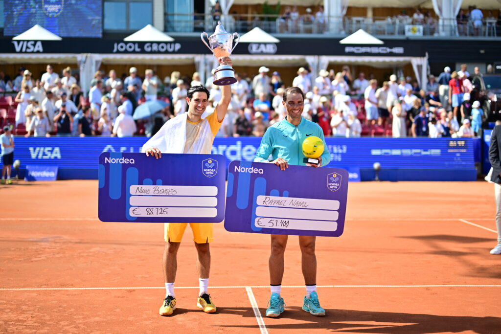 Nuno Borges and Rafael Nadal pose with their trophies after the 2024 Swedish Open final.