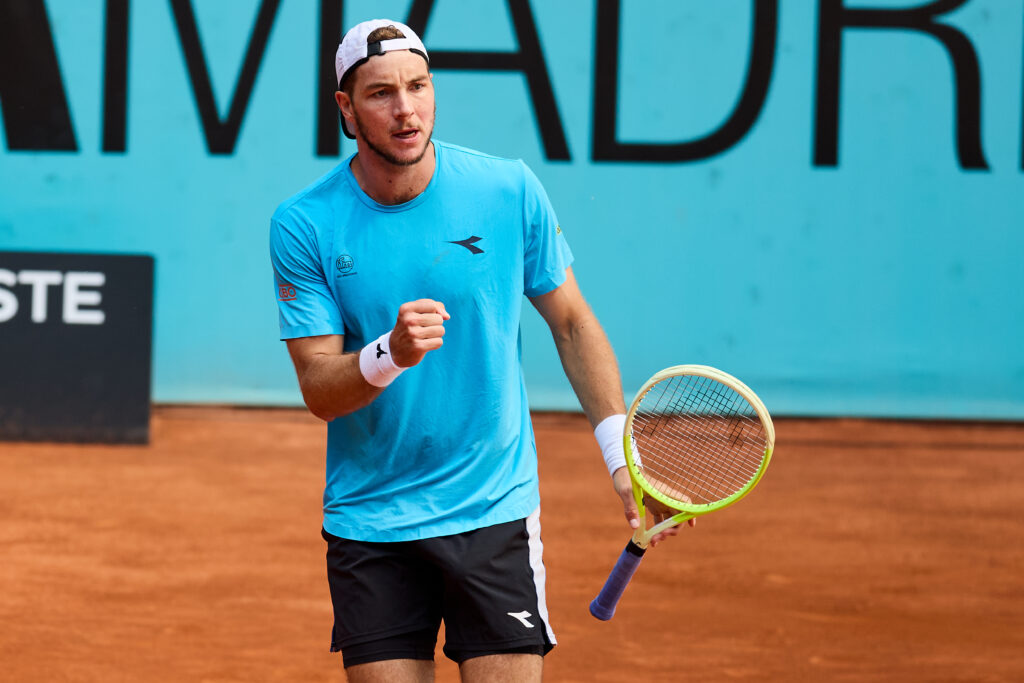 Jan-Lennard Struff reacts during his match against Stefanos Tsitsipas at the 2025 Madrid Open.
