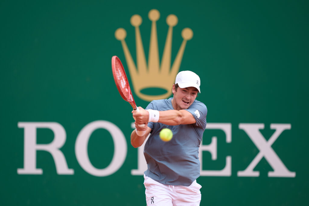 Joao Fonseca hits a backhand during his match at the 2026 Monte Carlo Masters.