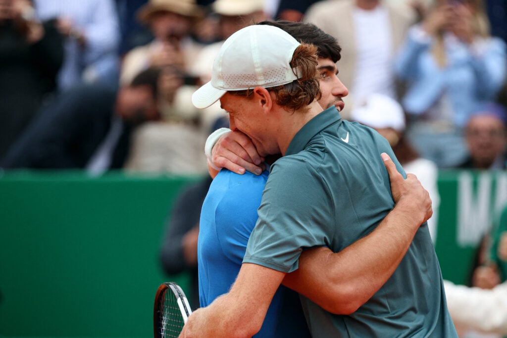 Carlos Alcaraz hugs Jannik Sinner after the 2026 Monte Carlo Masters final.