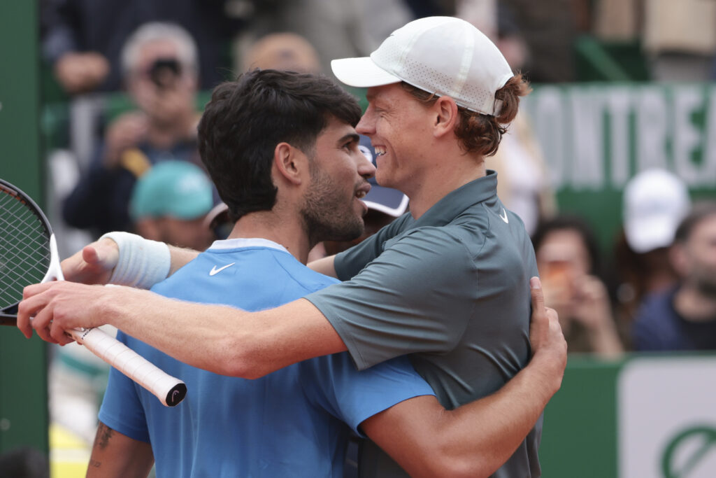 Carlos Alcaraz embraces Jannik Sinner after the 2026 Monte Carlo Masters final.