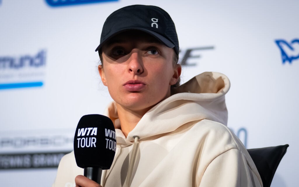 Iga Swiatek speaks in a press conference.