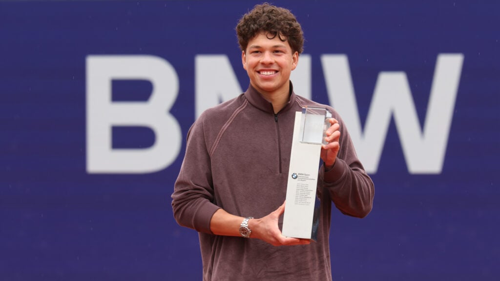 Ben Shelton poses with the BMW Open trophy after beating Flavio Cobolli in the 2026 final.