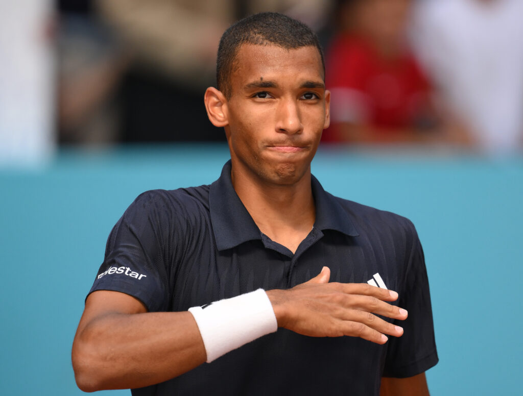 Felix Auger-Aliassime look on in Madrid.