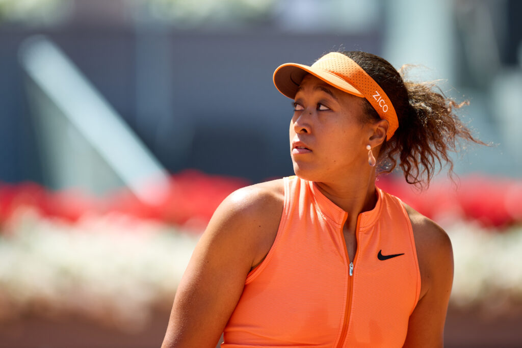 Naomi Osaka looks on during her match against Aryna Sabalenka at the 2026 Madrid Open.