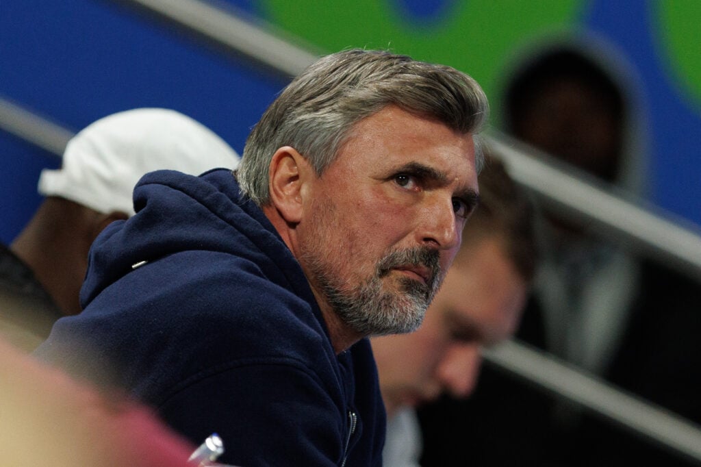 Goran Ivanisevic looks on.