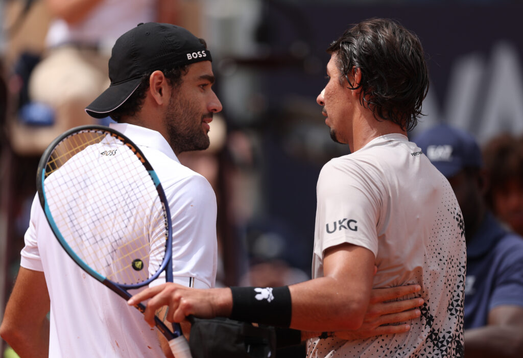 Matteo Berrettini and Alexei Popyrin embrace in Rome.