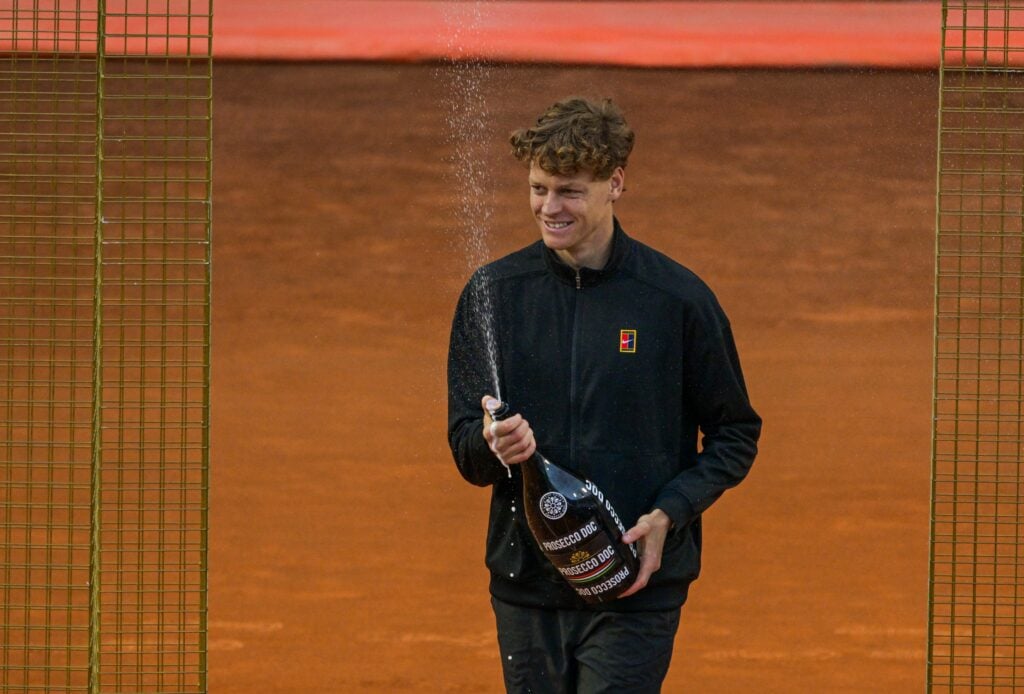 Jannik Sinner celebrates after winning the Italian Open.