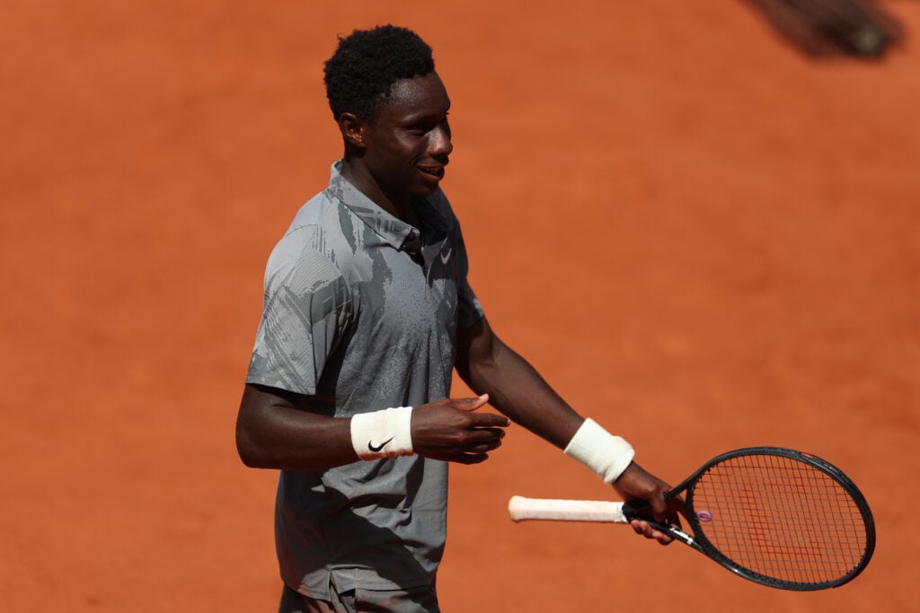 Moise Kouame is seen on his way to victory at Roland Garros.