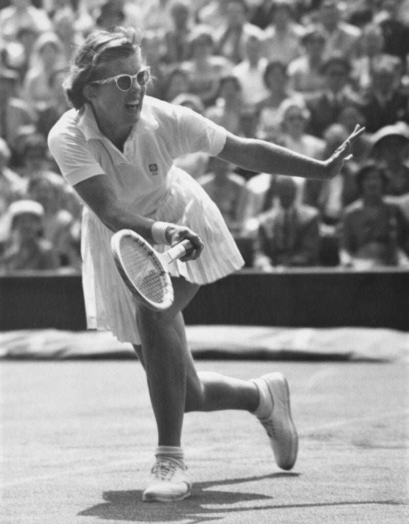 Dorothy Head Knode ( July 4, 1925 - October 25, 2015) of the United States makes a forehand return against Shirley Brasher during the singles match of the 30th edition of the Wightman Cup women's team tennis competition between the United States and Great Britain on 14th June 1958 at the All England Lawn Tennis and Croquet Club in Wimbledon, London, England. Great Britain defeated the United States 4 - 3.