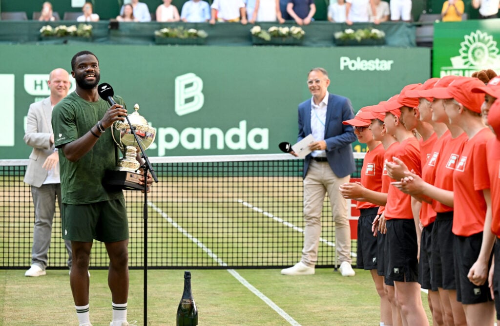 Frances Tiafoe speaks at the Halle Open trophy ceremony.