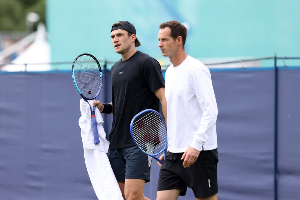 Jack Draper and Andy Murray look on at the Eastbourne Open.