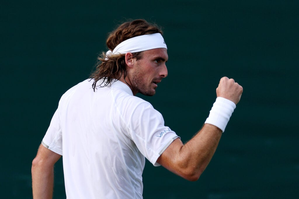 Stefanos Tsitsipas celebrates at Wimbledon in 2026.