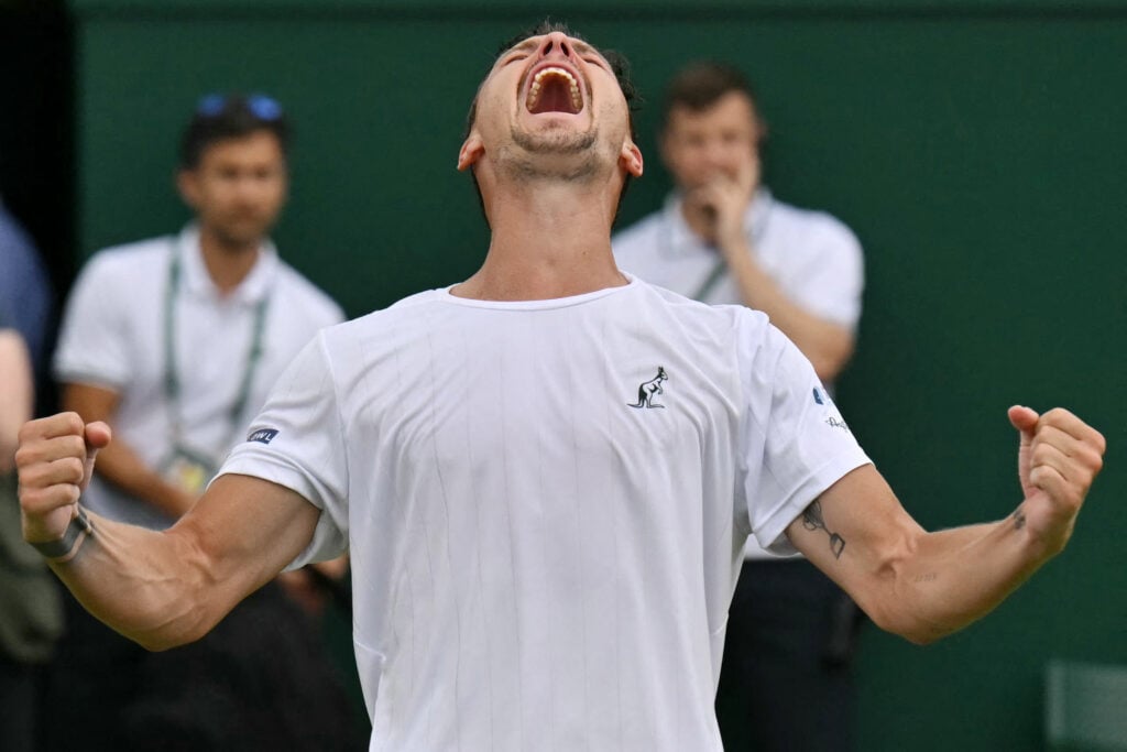 Marton Fucsovics celebrates at Wimbledon 2026