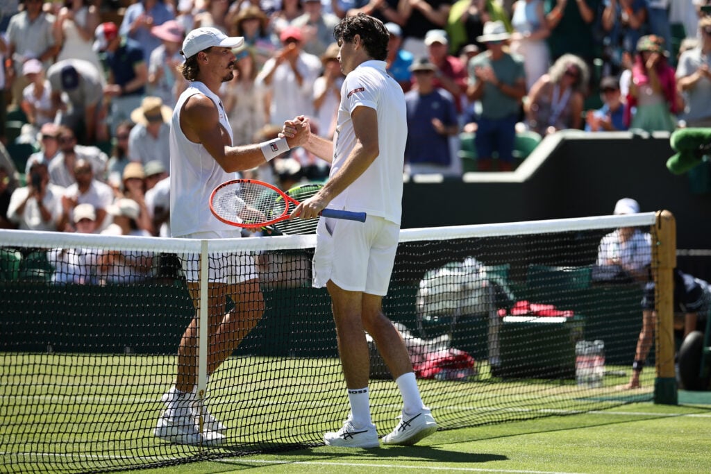 Taylor Fritz and Patrick Kypson shake hands at Wimbledon.