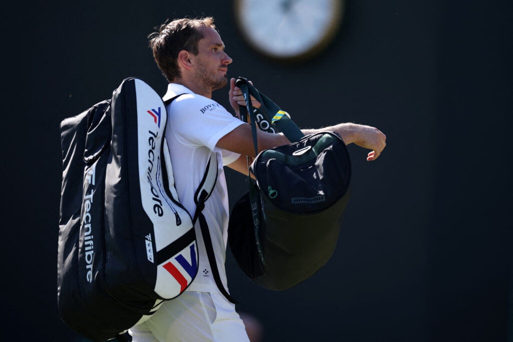 Daniil Medvedev leaves after losing at Wimbledon.