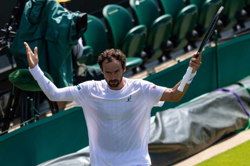 Roman Safiullin in action at Wimbledon.