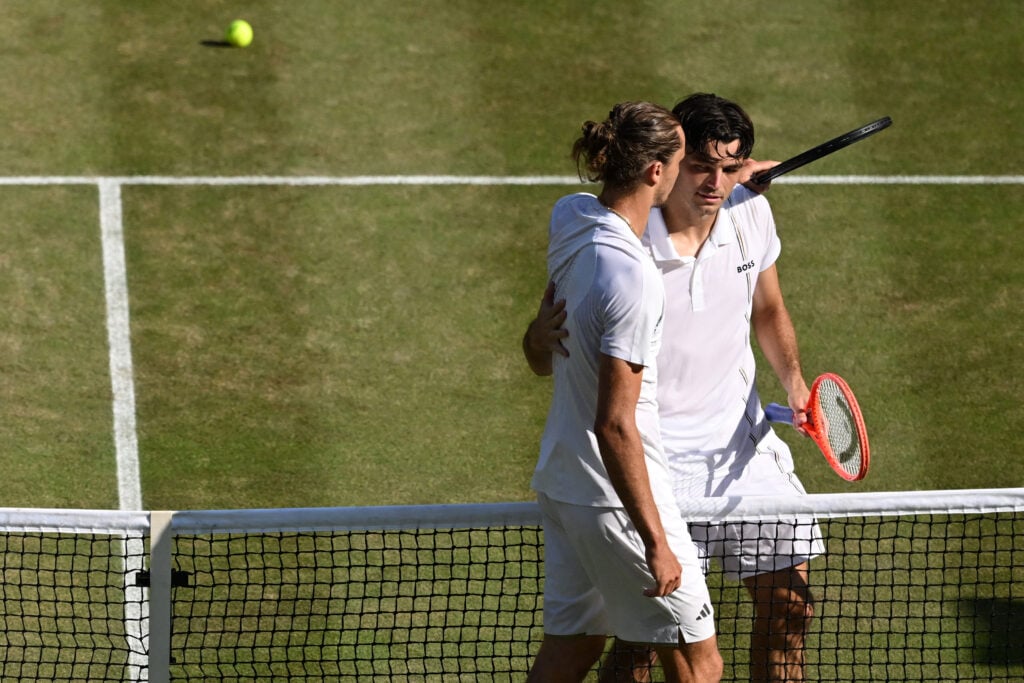 Taylor Fritz and Alexander Zverev embrace.