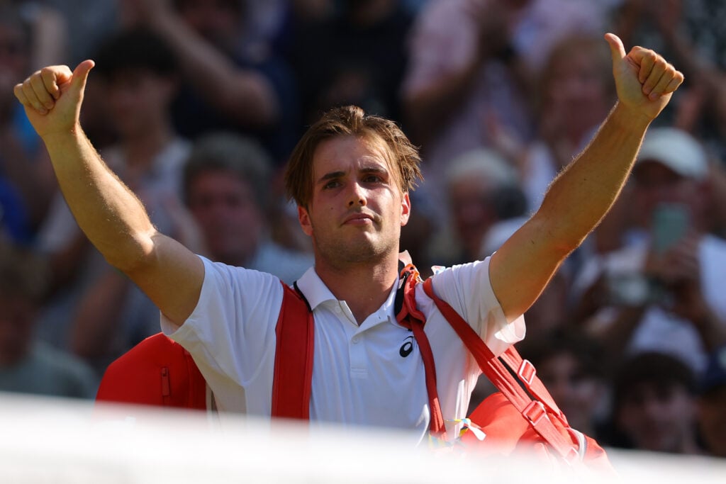 Arthur Fery celebrates after beating Flavio Cobolli at Wimbledon.