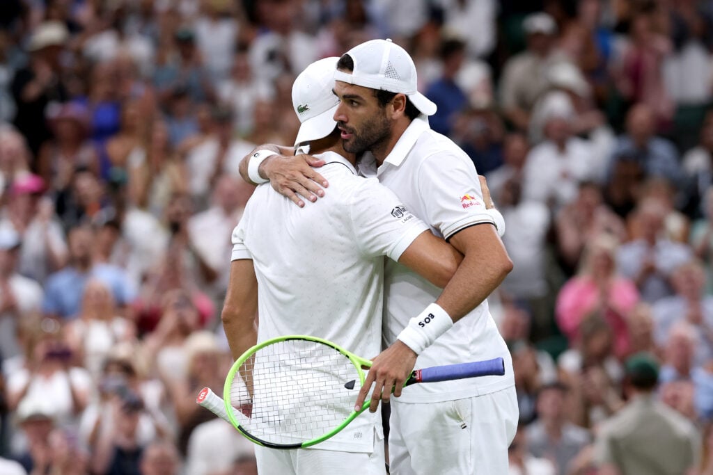 Grigor Dimitrov and Matteo Berrettini embrace.